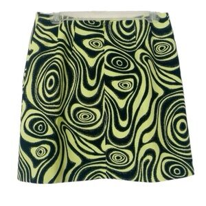 This Groovy green & black swirl print L mini skirt offers a vibrant, retro style